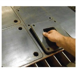 Manual work on a metal plate